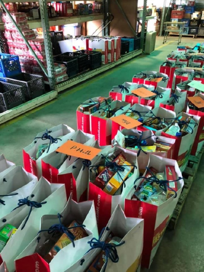 Bagged food donations sit in the Inter-Faith Treasure House warehouse in 2023.