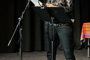 Washougal resident Susan Dingle reads poetry during an event in Vancouver, March 10, 2024. (Contributed photo courtesy of Deborah Nagano)