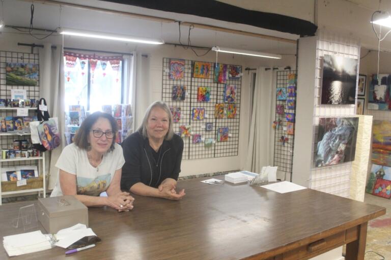 Doug Flanagan/Post-Record 
 Adret Artist Collective members Deborah Nagano (left) and Tamara Dinius pose for a photograph at the Collective's shared studio space in Washougal on May 2.