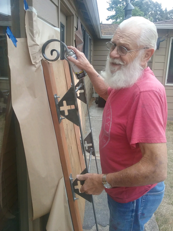 Dennis Helland, of Washougal, prepares the sleigh he will use during Christmastime, when Helland and his wife, Kooky Helland, greet children and visit local assisted living centers as Santa and Mrs. Claus.