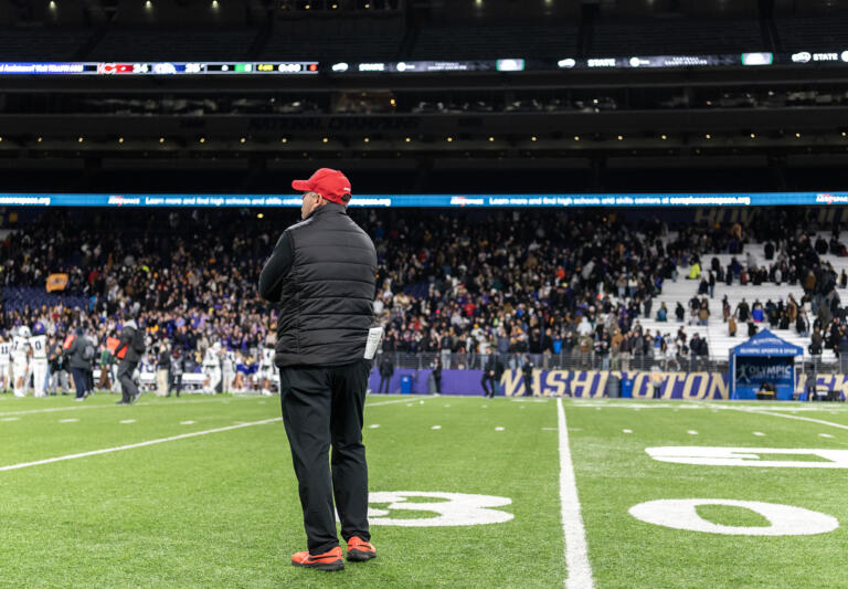 Camas coach Adam Matheson takes a moment Saturday, Dec. 7, 2024, after the Papermakers’ 27-24 loss to Sumner in the 4A State Championship game at Husky Stadium.
