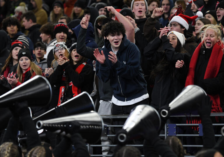 Camas students cheer Saturday, Dec. 7, 2024, during the Papermakers’ 27-24 loss to Sumner in the 4A State Championship game at Husky Stadium.