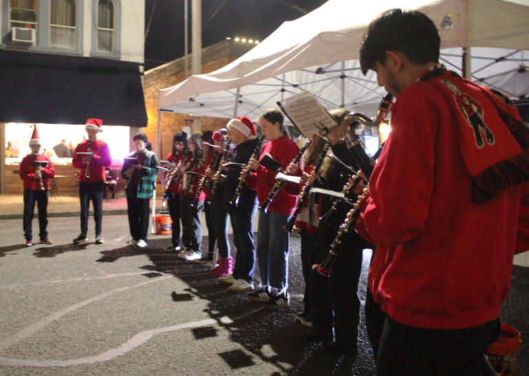 The Camas High School "Carolnets" perform on Northeast Cedar Street in downtown Camas during the 2024 Hometown Holidays event, Friday, Dec. 6, 2024.