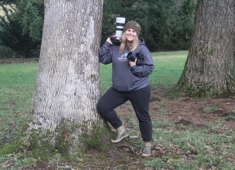 Jess Kristen Peterson, the owner of Fuzzy Butt Pet Photography, poses for a photo at her new Washougal property on Dec. 16, 2024.
