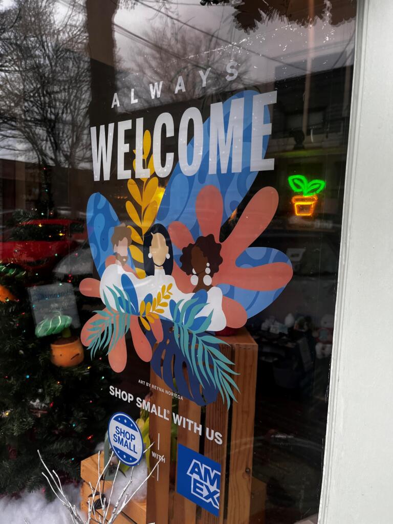 An "always welcome" sign hangs in the front window of LiveWell Camas, a yoga-fitness studio and gathering space in downtown Camas on Thursday, Dec. 12, 2024.