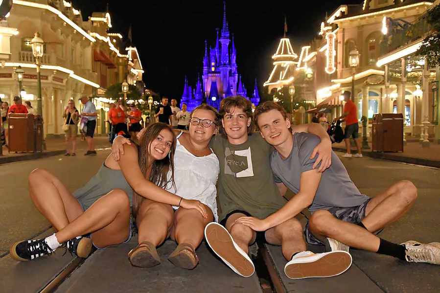 Contributed photo courtesy of Tami Grant 
 Washougal High School students, from left to right, Riley Vaughn, Mackenzie Olkowski, Gavin Johnson and Jude Maddox pose for a photo at the Walt Disney World Resort in Orlando, Florida, in July 2024. The quartet attended the 2024 Jostens Renaissance Global Conference (JRGC), where they received aJostens Gold Tier School of Distinction Award.