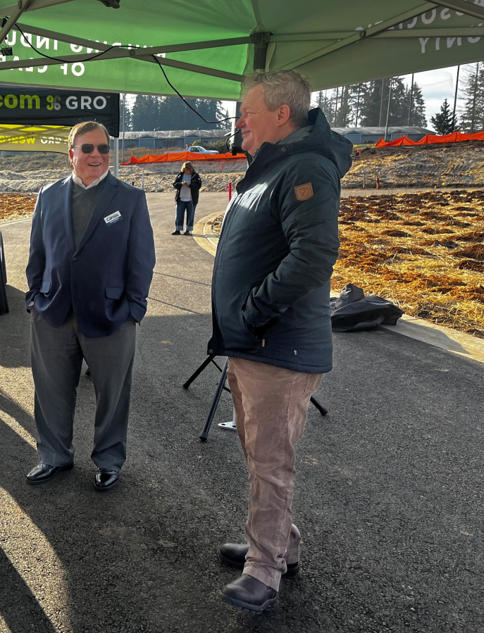 Camas Mayor Steve Hogan (left) speaks to community members at the 2025 GRO Parade of Homes kickoff event, held at The Nines at Camas Meadows on Thursday, Jan. 23, 2025.