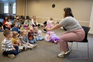 Library associate Stacy Yakouba, right, shares a story about pandas with youngsters during the children’s storytime at Camas Public Library on March 7. The library is hosting free training courses for people who want to learn how to be better advocates for their local library. (Amanda Cowan/The Columbian)