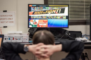 A Prairie High esports team member looks at a monitor displaying Super Smash Bros. Ultimate on Wednesday during practice at Prairie High School. (Taylor Balkom/The Columbian)