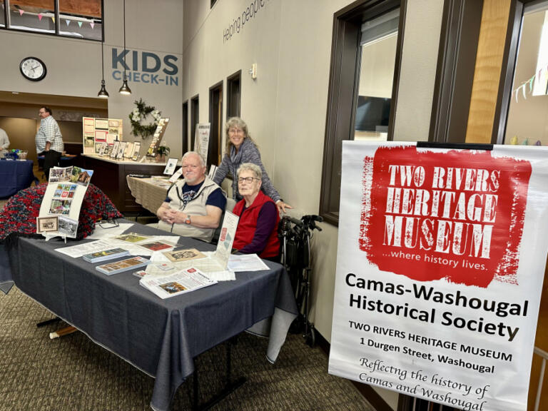 Two Rivers Heritage Museum volunteers attend the Downtown Camas Association&rsquo;s 2024 &ldquo;Spring into History&rdquo; First Friday event on April 5, 2024.
