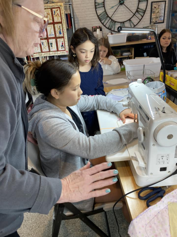 Buggy Eakin's sewing group makes reusable menstruation pads in an undated photo. The pads were sent to Uganda in 2024 to help women and girls who live in areas with limited garbage pickup service and struggle to throw away the common disposable pads commonly used in other countries. (Contributed by Buggy Eakin)