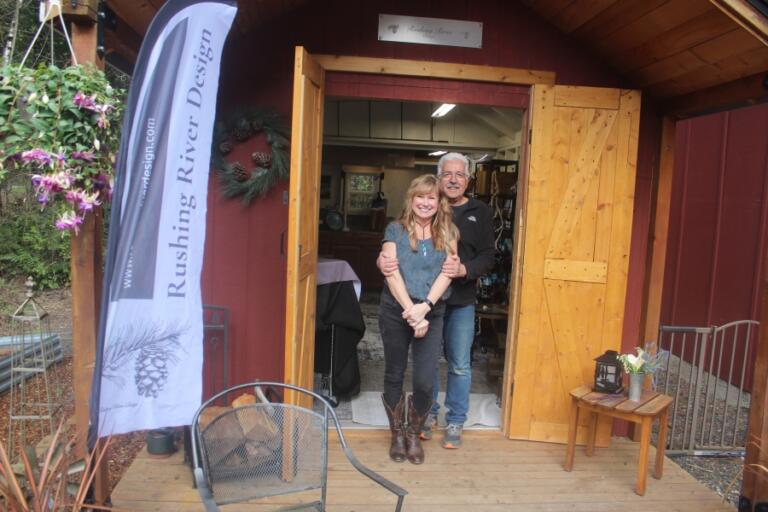 Michelle Wright, left, poses for a photo with her husband, Gary Wright, in front of the &ldquo;she shed&rdquo; at their rural Camas home on April 11.