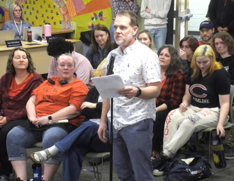 Camas music teacher Erik Edmundson speaks to the Camas school board on Monday, April 28, 2025. Dozens of community members filled the board meeting Monday evening to speak against proposed cuts to the district&rsquo;s secondary music programs.