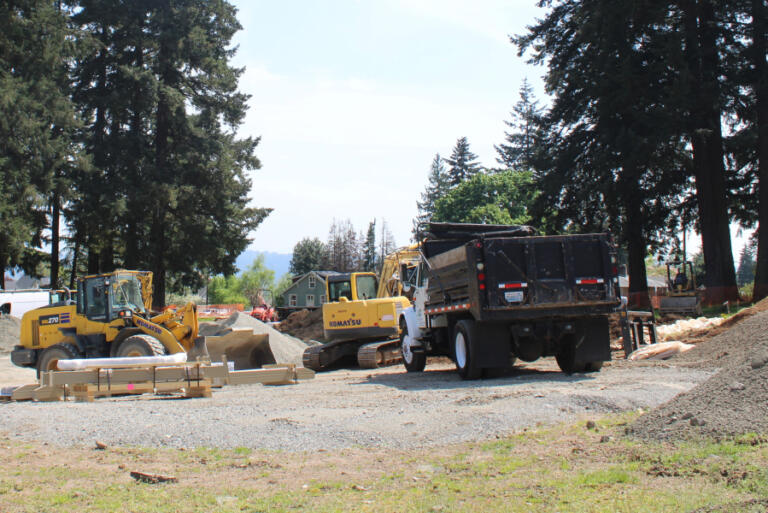 Construction vehicles are parked near the site of a future multiuse sport court inside Camas&rsquo; historic Crown Park on Friday. The sport court will be one of several improvements included in the park&rsquo;s $6.3 million remodel.