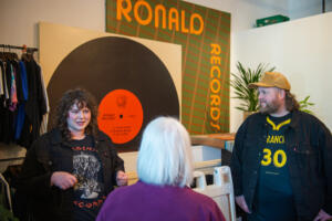 U.S. Sen. Patty Murray, D-Wash., center, talks with Jon and Kelsey Jennings, owners of Ronald Records in downtown Vancouver, about supply disruptions and materials prices affected by the Trump administration’s tariffs during a Thursday visit. (James Rexroad/for The Columbian)