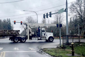 A truck drives through the intersection of Northeast 13th and Northwest Friberg-Strunk streets in Camas near the site of a proposed gas station development on March 4, 2024. (Kelly Moyer/Post-Record files)