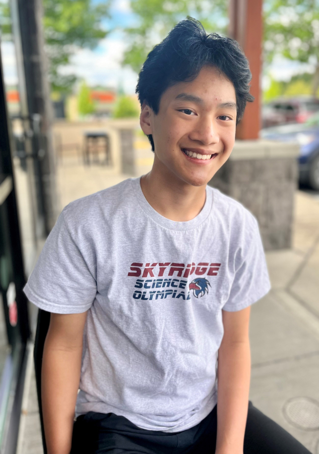 Daniel Liu, 13, an eighth-grader at Skyridge Middle School in Camas, sits outside a Camas-area cafe May 15 and talks about his experience as a member of the Skyview Science Olympiad team that recently won first place at the state competition and is headed to the national tournament May 23-24.