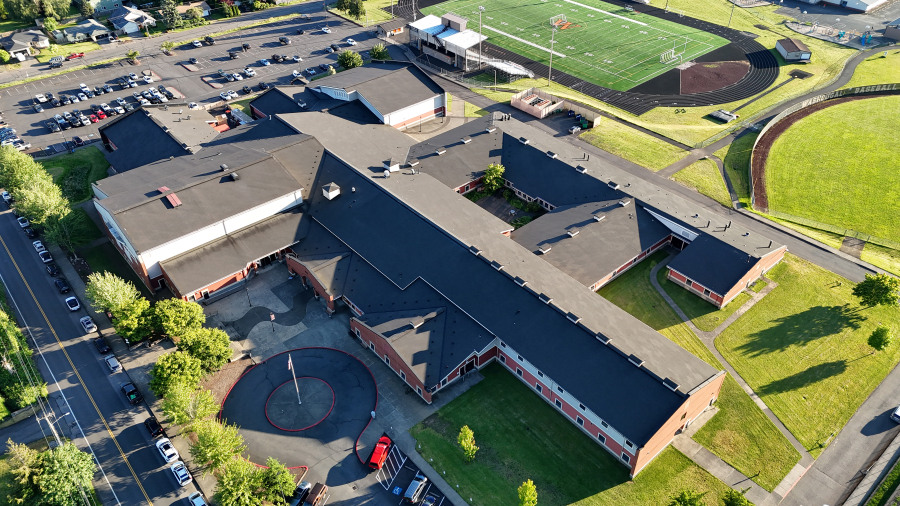 Constructed in the late 1990s, the roof on top of Washougal High School has deteriorated to the point that it is leaking and causing water damage inside the school building. The Washougal School District plans to replace the roof this summer. (Photo contributed by Garland Industries)