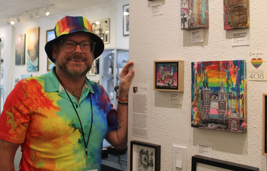 Portland artist Chuck Bloom stands near his artwork inside Gallery 408 in downtown Camas on Friday, June 6, 2025. Bloom is one of several Gallery 408 artists who have donated artwork to benefit a fundraiser for Cascade AIDS Project, the largest community-based HIV services provider in Southwest Washington and Oregon.