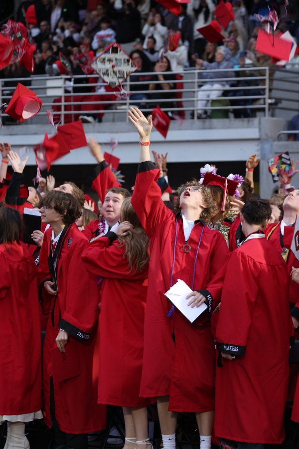 Camas High School class of 2025 graduates toss their caps at the end of the school’s commencement ceremony at Doc Harris Stadium in Camas on Friday, June 13, 2025. (Courtesy of Doreen McKercher, Camas School District)