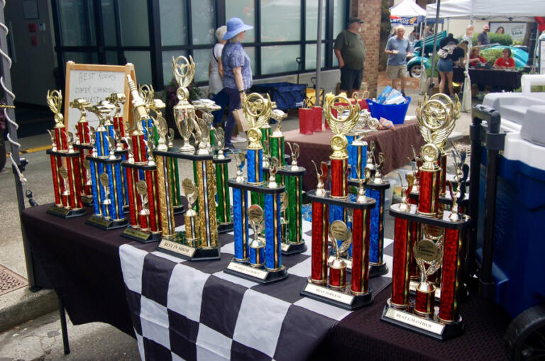 Trophies line a table at the Downtown Camas Association&rsquo;s 2024 Camas Car Show on June 29, 2024, in downtown Camas.