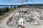 A construction crane arrives at the Hyas Point development construction site June 6 in Washougal. (Courtesy of RKm Development)