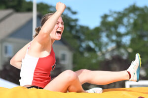 Camas senior Karina Cooper celebrates after clearing 13 feet, 2 inches in the 4A girls pole vault at the WIAA State Track and Field Championships in Tacoma on May 30. (Photos by Taylor Balkom/The Columbian)