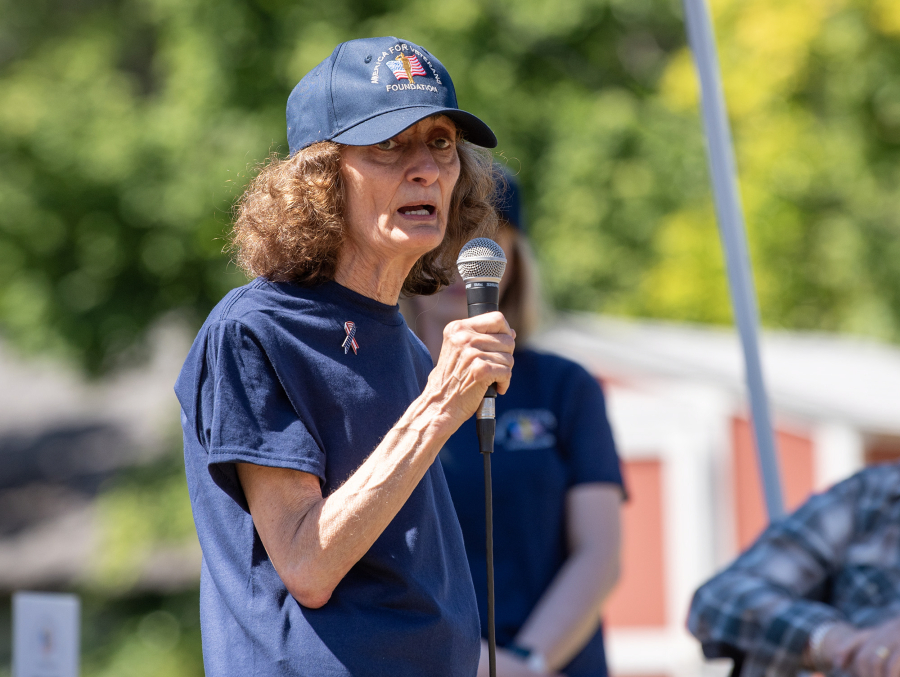 America for Veterans Foundation board member Rosemary Fryer speaks to a crowd during a groundbreaking ceremony June 10, 2025, for Veterans Village. Women veterans are four times more likely to experience homelessness than male veterans.
