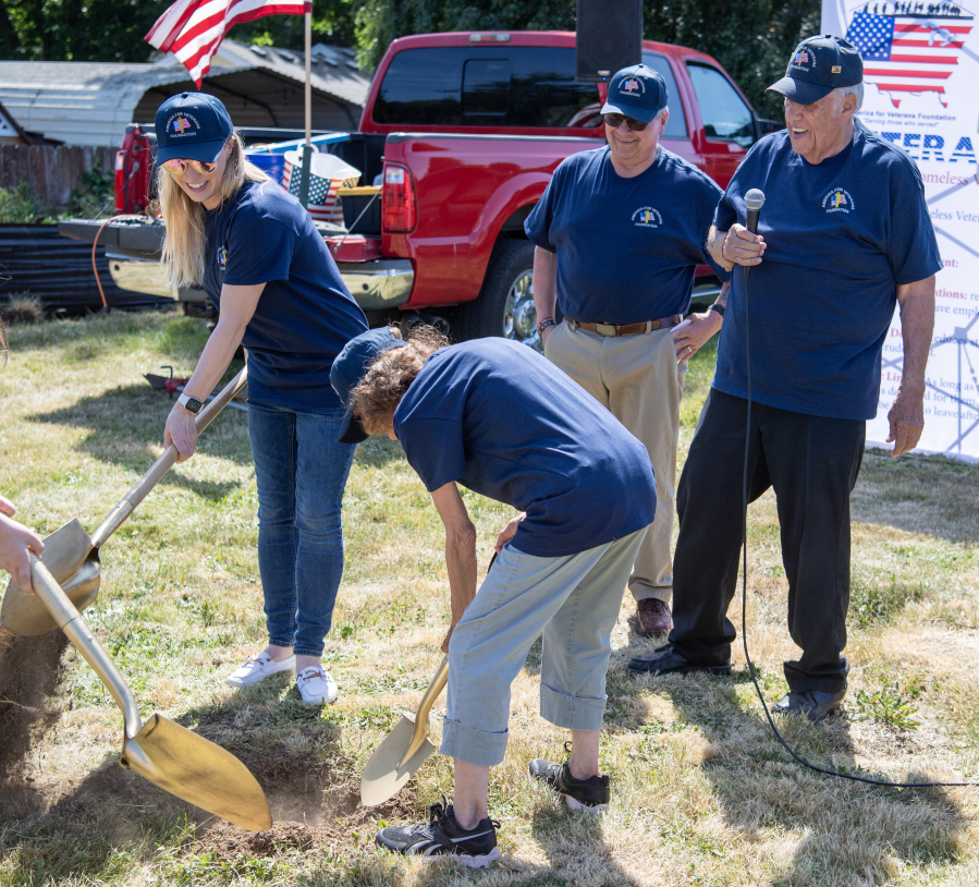 Dignitaries use gold shovels Tuesday during a groundbreaking ceremony for America for Veterans Foundation’s 32-unit residential community for women veterans. (Photos by Taylor Balkom/The Columbian)
