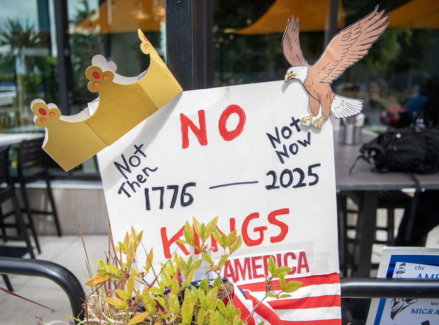 A sign sits in a planter Saturday, June 14, 2025, on Waterfront Way at the Vancouver waterfront.