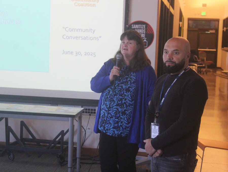 Unite! Washougal Community Coalition Director Margaret McCarthy, left, and coordinator Vitali Turlac speak during a community town hall presented by the Unite! Washougal Community Coalition at Washougal High School on June 30. (Doug Flanagan/Post-Record)