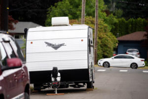 A trailer is seen parked on the side of a street in Camas on June 20. The city of Camas implemented strict recreational vehicle and trailer parking and occupancy rules. (Amanda Cowan/The Columbian files)