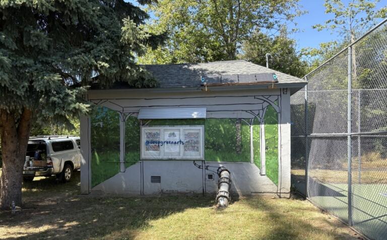 Washougal artist Travis London is painting a mural on the south side of the pump house next to Wolfe Courts at Hathaway Park in Washougal.