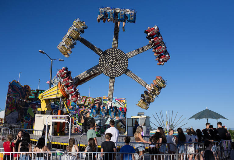 Thrill seekers go for a spin at the Clark County Fair on Aug. 5, 2024.