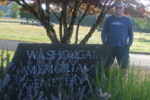 Washougal resident Tim Hagensen poses for a photo at the Washougal Memorial Cemetery on July 28, 2025. (Doug Flanagan/Post-Record)