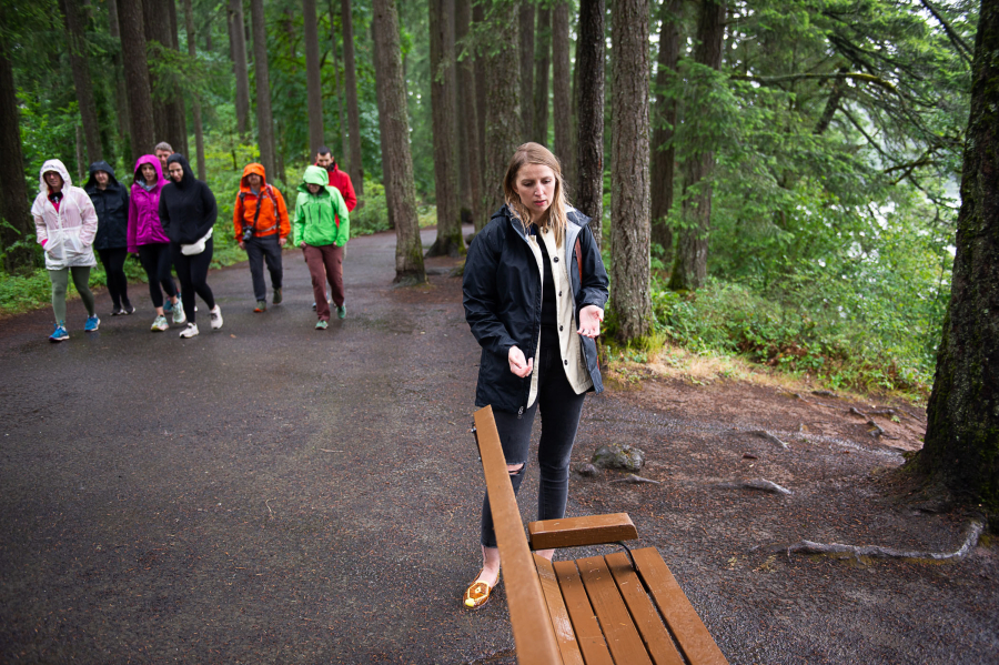 Luba Ross of Camas stands on the Round Lake trail in Camas on June 20, near the spot where, on July 28, 2024, she discovered a Vancouver man who had been missing for two days. Ross received the Camas Police Department&rsquo;s 2025 Civilian Service Award for reuniting the man with his family. (James Rexroad/for The Columbian)