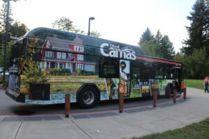 A C-Tran bus highlighting the city of Camas on one side, the Camas lily on the back and the Camas School District on another side sits outside the Lacamas Lake Lodge during the 2019 Camas State of the Community. (The Columbian files)