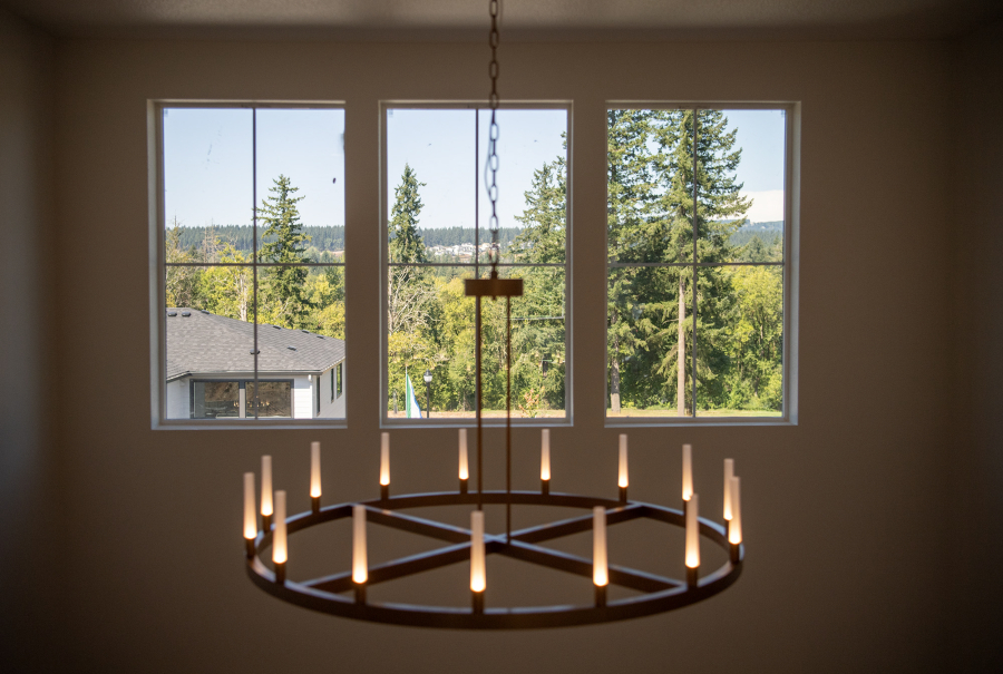 The hillside is visible through a high window in a townhome Tuesday, July 29, 2025, in Camas. This is the first year the Parade of Homes includes multi-family housing. (Taylor Balkom/The Columbian)