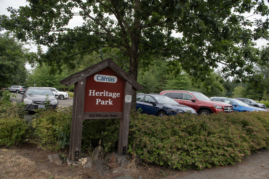 A visitor to Heritage Park looks for a parking spot in Camas on a Thursday afternoon in July. The city of Camas has entered into a three-year partnership with an artificial intelligence company to track crowd sizes at city events and in public spaces such as Heritage Park, which often sees overcrowding and parking challenges. (Amanda Cowan/The Columbian)