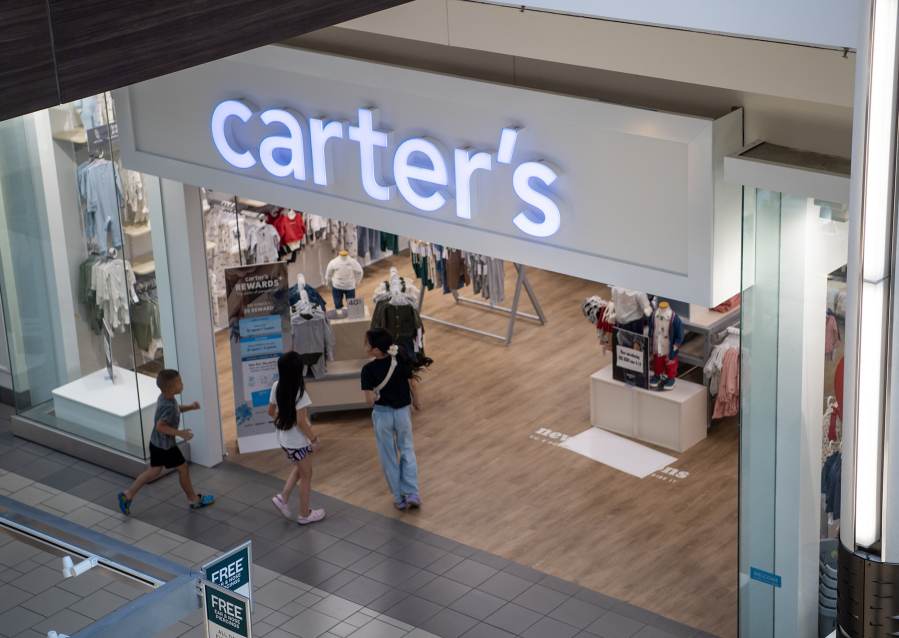 Kids walk into Carter&rsquo;s on Wednesday at Vancouver Mall. (Photos by Taylor Balkom/The Columbian)