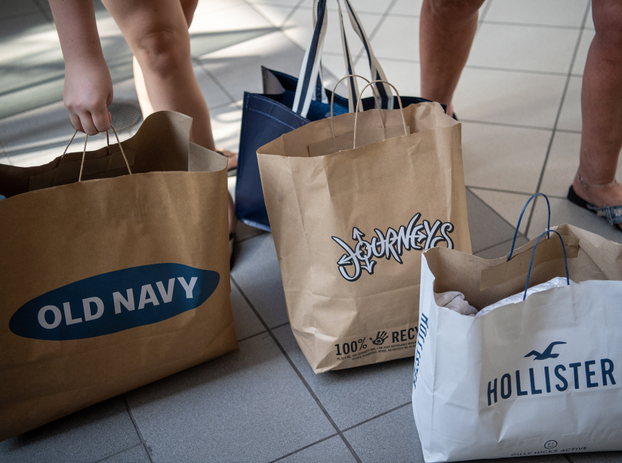Shoppers place their bags on the floor at Vancouver Mall on Wednesday, Aug. 13, 2025.