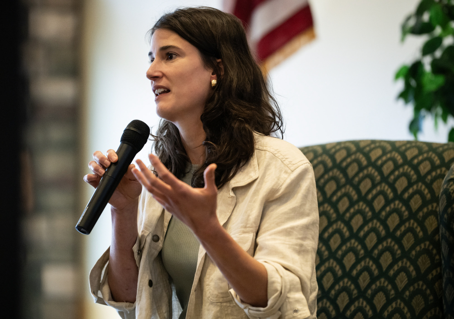 U.S. Rep. Marie Gluesenkamp Perez, D-Skamania, answers a question Wednesday at a town hall at the Battle Ground Event Center. The two-term congresswoman answered audience members&rsquo; written questions for more than an hour Wednesday. (Taylor Balkom/The Columbian)