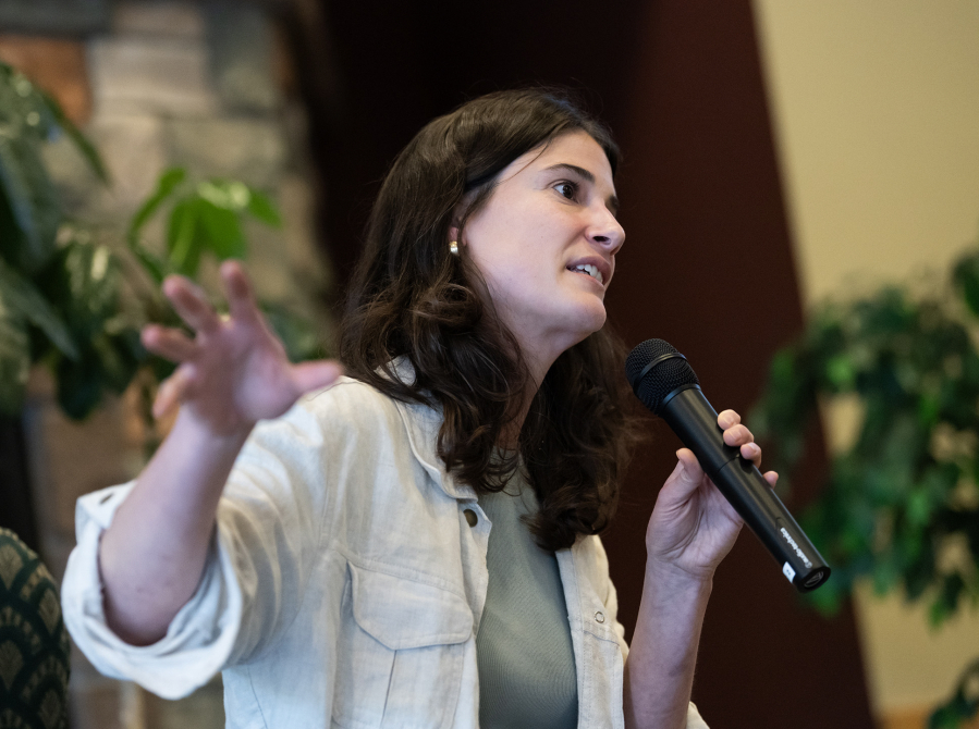U.S. Rep. Marie Gluesenkamp Perez, D-Skamania, answers a question Wednesday during a town hall at the Battle Ground Event Center. (Taylor Balkom/The Columbian)