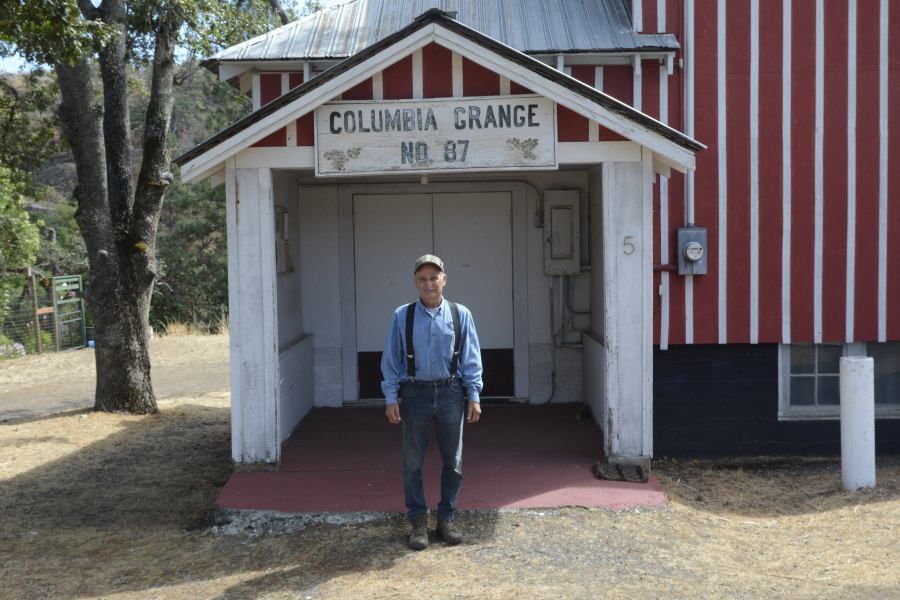 Charlie Deach, 76, president of the Columbia Grange, saved the hall from the Burdoin Fire in July. (Emily Rogers/The Columbian)