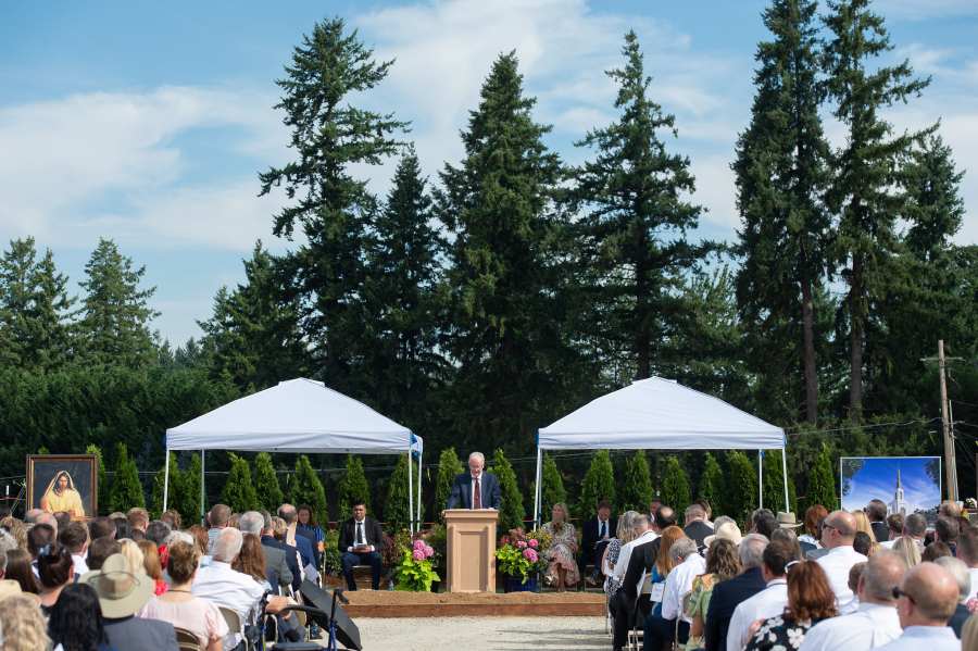 Elder Mark A. Bragg speaks to the crowd during the groundbreaking ceremony for the Vancouver Washington Temple. It will be built on a 15.11-acre plot on the Vancouver/Camas border, and will be 43,000 square feet and several stories tall. (Photos by James Rexroad for The Columbian)