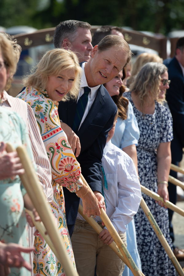 Elder Mark A. Bragg looks for the cue to turn a shovel of ceremonial dirt at Saturday’s groundbreaking ceremony for The Church of Jesus Christ of Latter-day Saints Vancouver Washington Temple. (James Rexroad/for The Columbian)