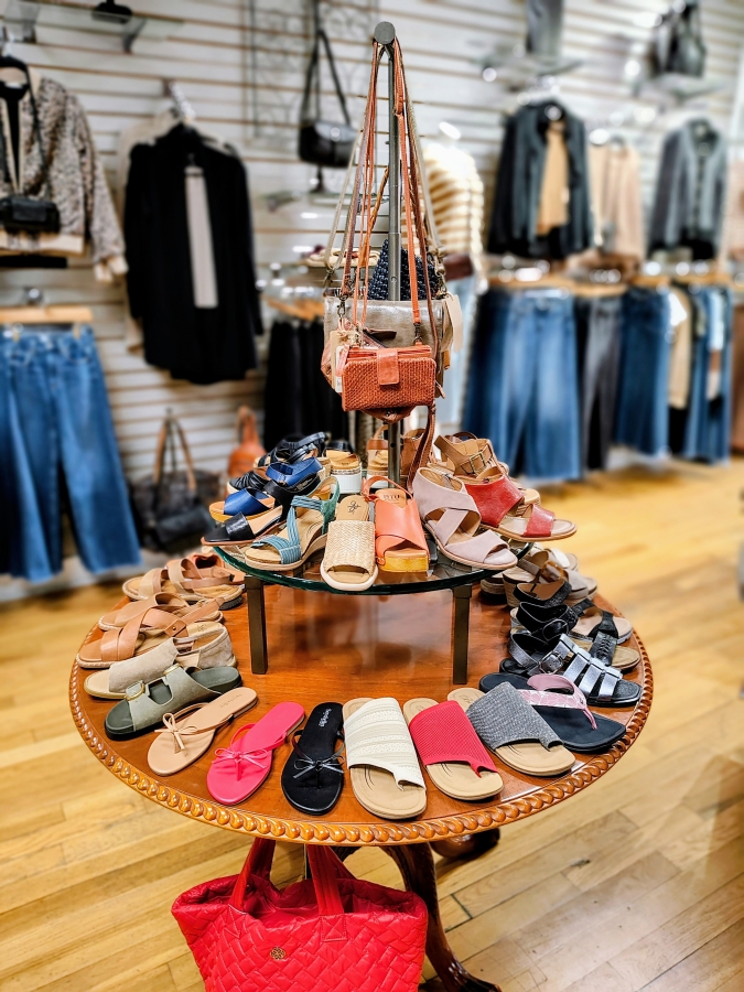 Women&rsquo;s shoes and handbags are displayed on a table in the Arktana women&rsquo;s boutique in downtown Camas on Friday, Aug. 29, 2025.. (Doug Flanagan/The Columbian)