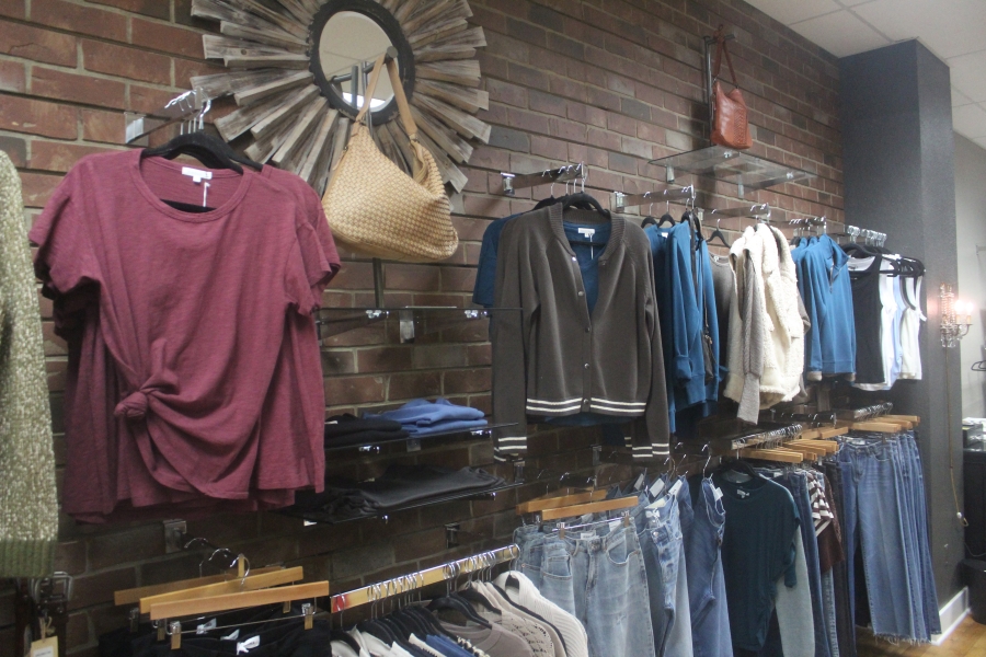 Women&rsquo;s shirts and pants are displayed in the Arktana women&rsquo;s boutique in downtown Camas on Friday. (Doug Flanagan/The Columbian)