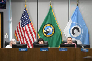 C-Tran Board Composition Review Committee members Sue Marshall, from left, Michelle Belkot and Matt Little listen to public comment Aug. 12 during a meeting at the transit agency’s headquarters in Vancouver. (Taylor Balkom/The Columbian files)