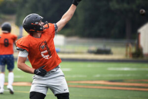 Washougal senior Travis Lundberg makes a one-handed catch during a receiving drill. Lundberg is part of what Panthers head coach Dave Hajek calls a ‘core’ player on the team. (Micah Rice/The Columbian)